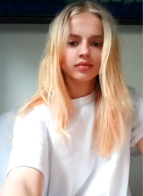 blonde girl taking off her clothes on live stream showing thumbnail